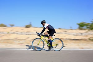 Man Riding Bicycle