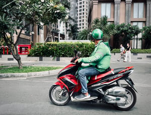 A Grab Biker looking for his customer