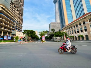 A woman driving a motobike