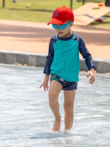 A boy in a swimming pool