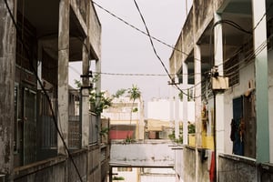 Old apartment buildings with messy power lines