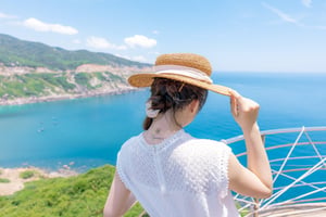 A girl posing for a photo on a lighthouse