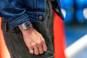 A man with his Rolex Submariner Watch
