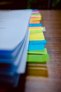 Document with colorful stickers