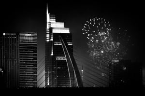 Crowd watching fireworks on Ba Son bridge