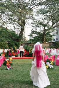 The bride is walking toward her groom