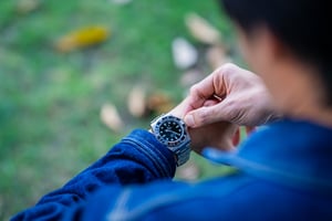 A fashionable man with his luxury Rolex watch