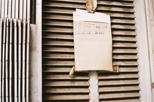 Old nostalgic handwritten note on vintage wooden shutter