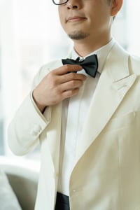Man adjusting his suit