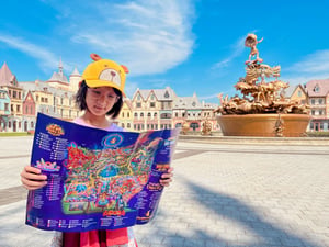 Girl Browsing VinWonder Map