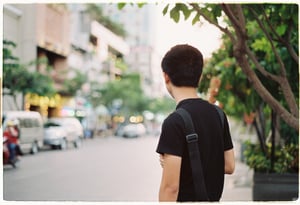 A man looking at the street