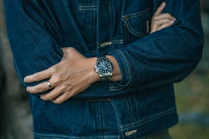 A man with his Rolex watch