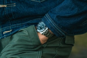 A fashionable man with his luxury Rolex watch