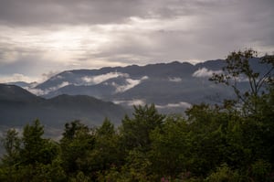 Sun, Cloud and Mountains