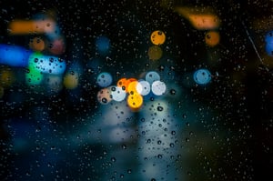 Bokeh Traffic Light behind raindrops