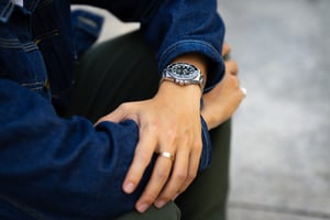 A man with his Rolex luxury watch