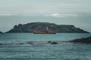Boats by the island