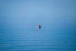 Lonely Boat in the fog