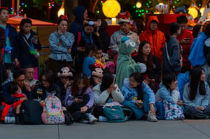 Young people waiting in a theme park