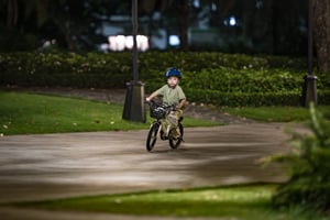Kid riding bicycle