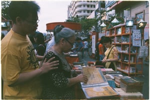 Elderly woman reading an old book