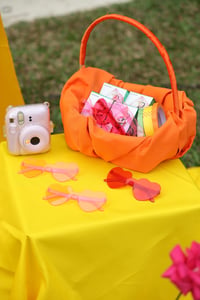 Colorful heart-shaped glasses and Instant Fujifilm