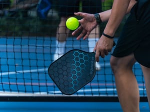Serving a pickleball match