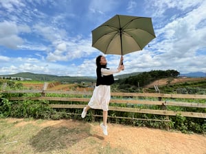 A girl get blown away by the wind
