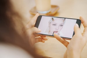 Watching makeup video on phone
