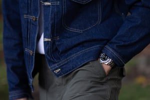 A fashionable man with his luxury Rolex watch