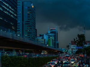 Bad traffic jam under a dark sky