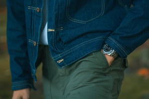 A fashionable man with his luxury Rolex watch