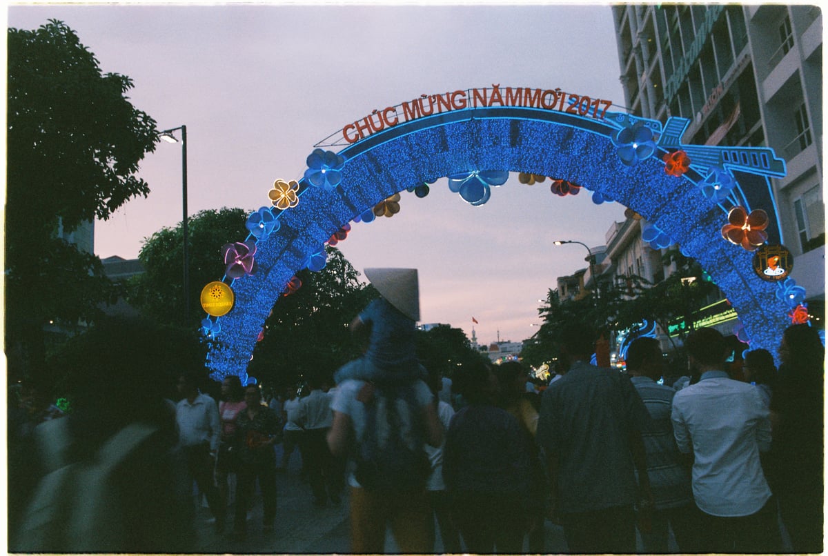 Vibrant nightlife on a famous pedestrian street in Ho Chi Minh City with New Year decorations