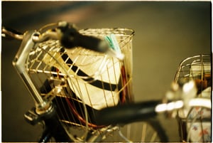 Straw hat in a bicycle basket