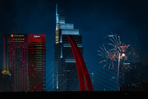 Crowd watching fireworks on Ba Son bridge