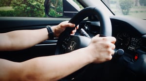 A Honda Driver on the wheel