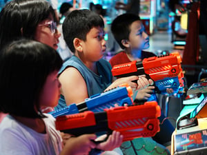 Kids playing shooting game