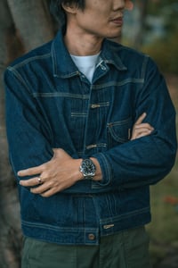 A man with his Rolex watch