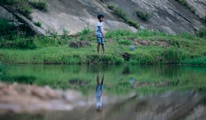 A fishing boy / Chú bé câu cá