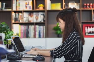 A girl working on a laptop