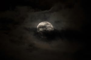 Dark and cloudy Halloween moon
