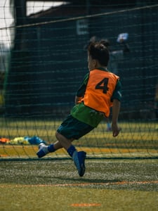 Boy shooting the ball