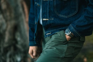 A fashionable man with his luxury Rolex watch