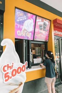 A girl ordering at McDonald