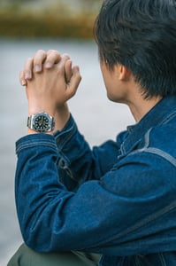 A man with his newly earned Rolex watch