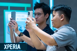 Men checking-out Sony Xperia phone