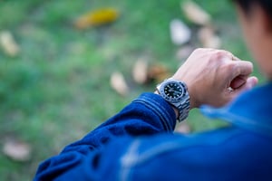A fashionable man with his luxury Rolex watch