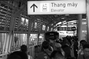 People are waiting eagerly on the station platform for the train