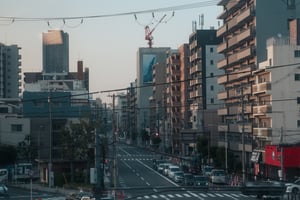 High angle view of a street with traffic and residential apartment buildings in Osaka
