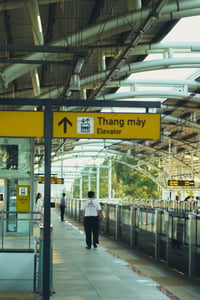 A HCMC Metro staff patrols the station